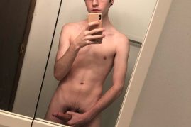 Cute nude mirror boy taking a selfie