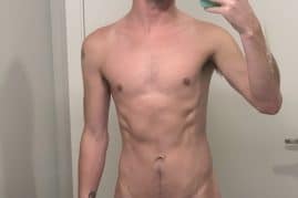 Nude boy taking a selfie