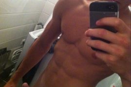 Nude muscle boy with a hard cock