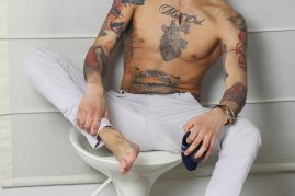 Tattooed boy with a big uncut cock